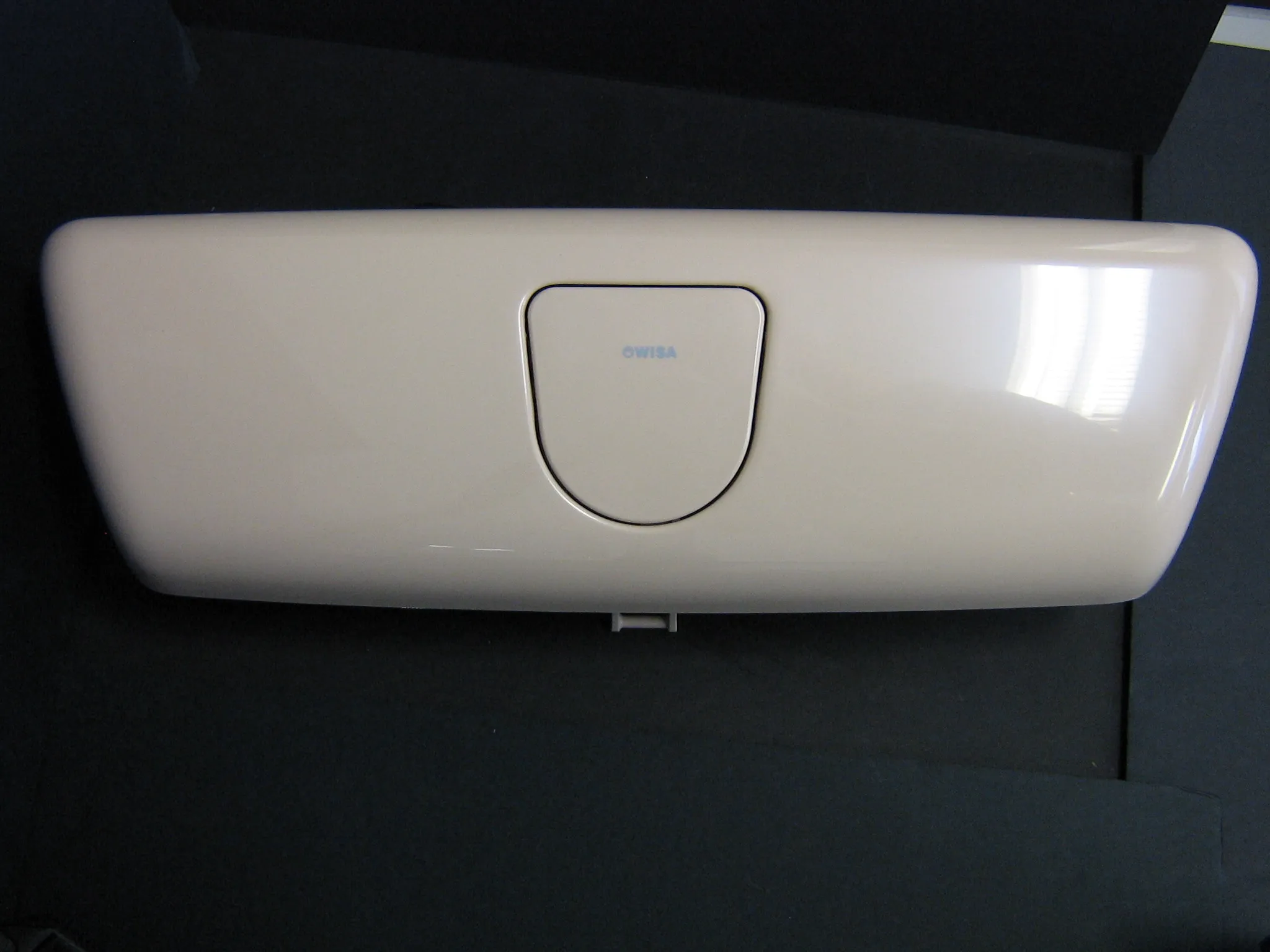 Cistern cover with a function button, beige